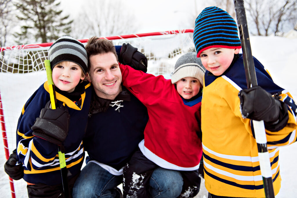 Happy,Funny,Kids,Playing,Hockey,With,Father,OnStreet,